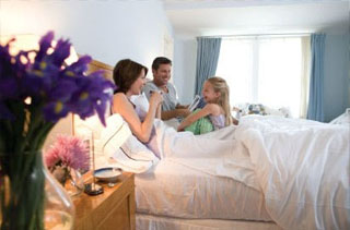 crew member examining furnace during an enegy audit
