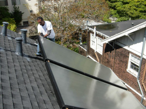 solar thermal being installed on a client's home